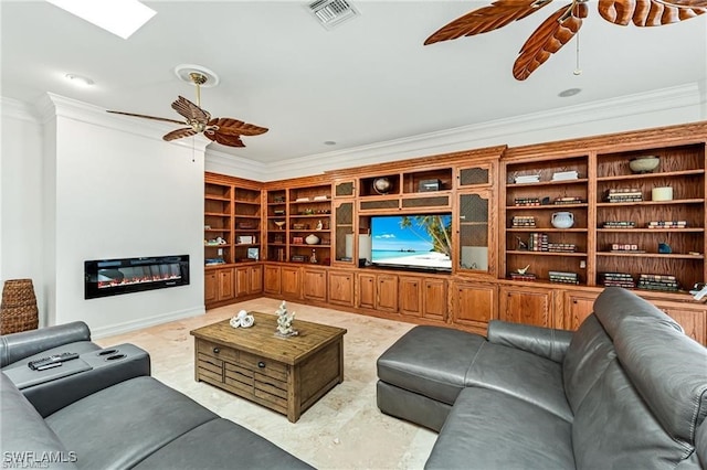 living room with crown molding, built in features, and ceiling fan