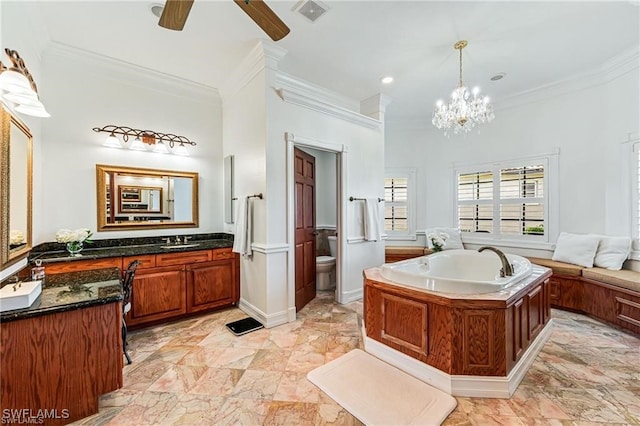 bathroom featuring ceiling fan with notable chandelier, toilet, vanity, and ornamental molding