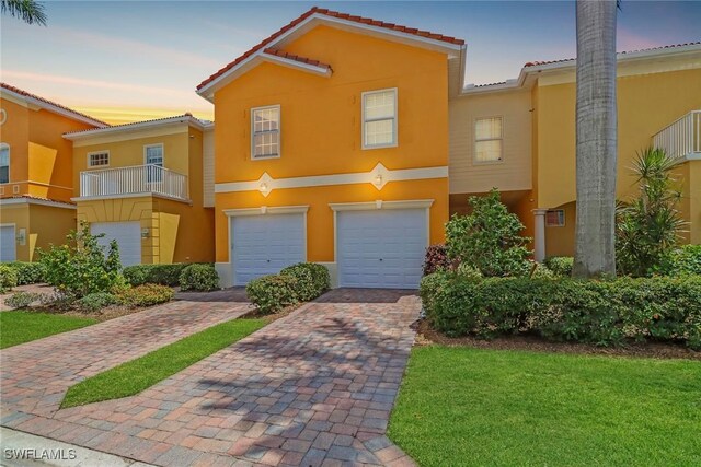 view of front of property with a garage