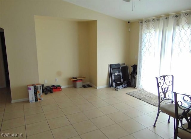 unfurnished room with light tile patterned floors