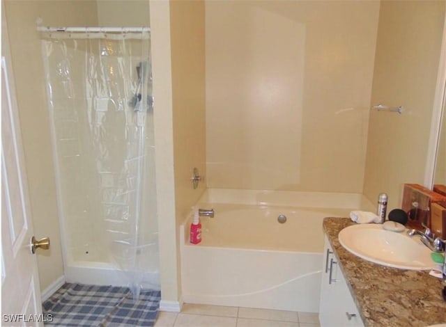 bathroom featuring tile patterned flooring, vanity, and independent shower and bath