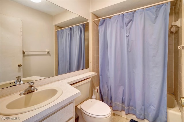 full bathroom featuring shower / bath combo with shower curtain, vanity, and toilet