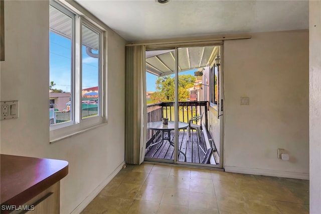 entryway featuring light tile patterned floors