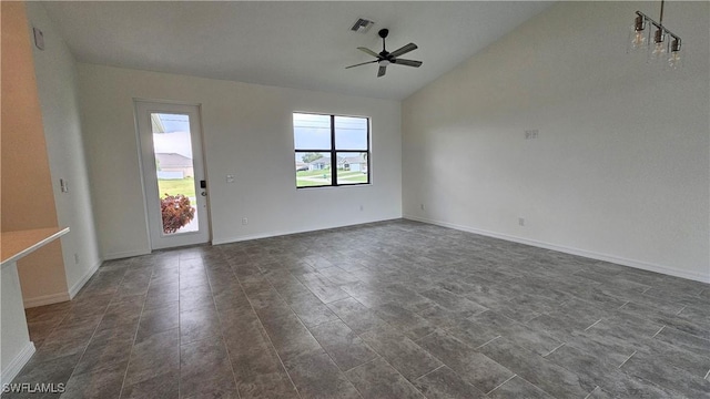 interior space with ceiling fan and lofted ceiling