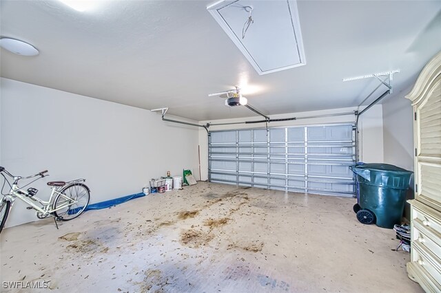 garage featuring a garage door opener