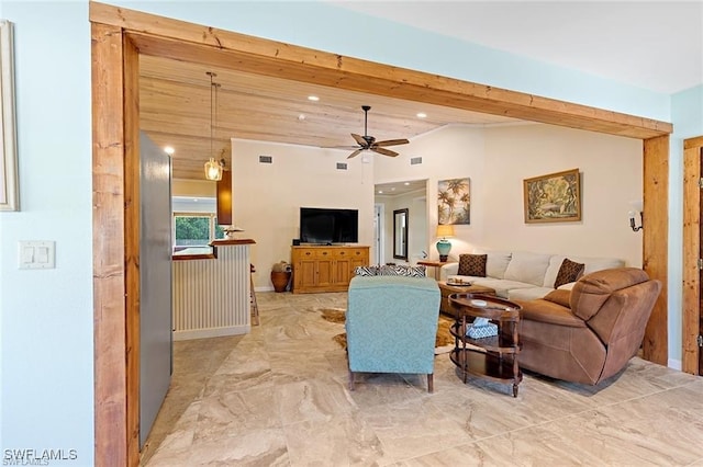 living room featuring ceiling fan and light tile patterned flooring