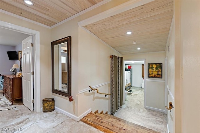 hall with wood ceiling, crown molding, and light tile patterned floors