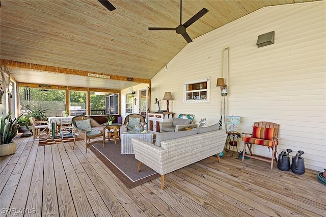 sunroom / solarium featuring ceiling fan, wooden ceiling, and vaulted ceiling