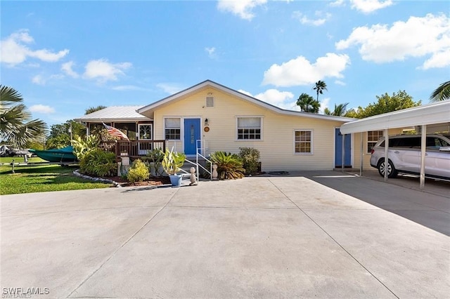 view of front of house featuring a carport