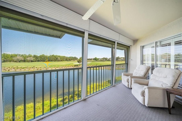 sunroom with a water view