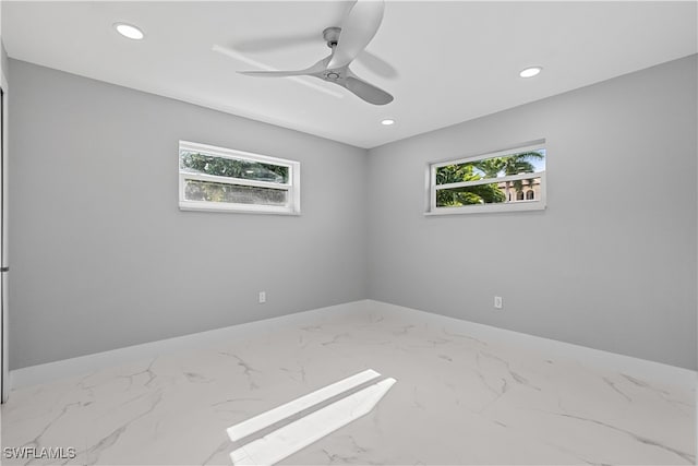 spare room featuring ceiling fan