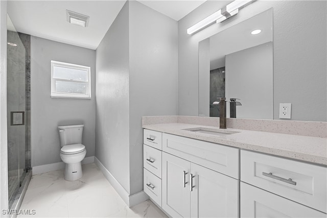 bathroom featuring tile patterned flooring, an enclosed shower, vanity, and toilet