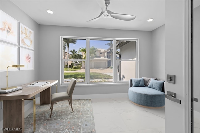 tiled office space with ceiling fan