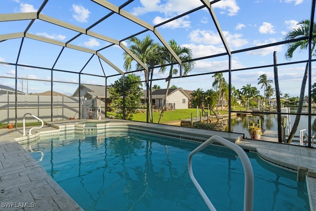 view of swimming pool featuring a water view, a lanai, and a patio area