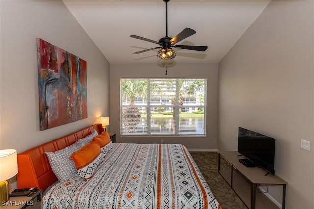 bedroom with carpet flooring, a ceiling fan, and baseboards