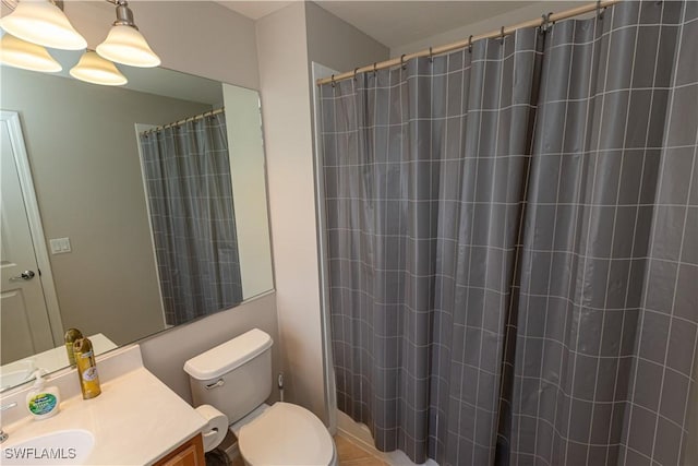 full bathroom with a shower with shower curtain, vanity, and toilet