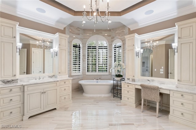 bathroom featuring vanity, a raised ceiling, crown molding, a washtub, and tile walls