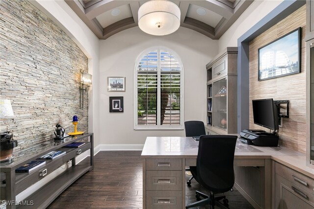 office space featuring beam ceiling, dark hardwood / wood-style flooring, and high vaulted ceiling