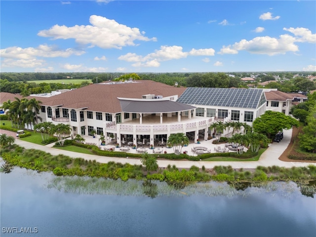 exterior space with a water view