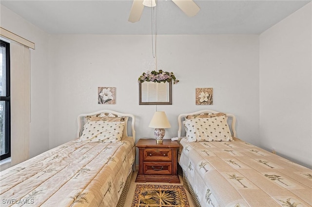 bedroom featuring ceiling fan