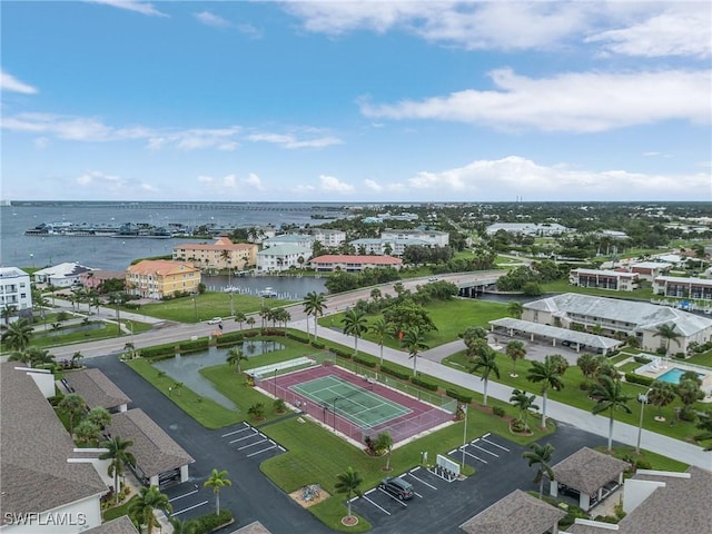 birds eye view of property featuring a water view