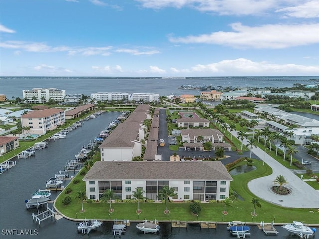 bird's eye view with a water view