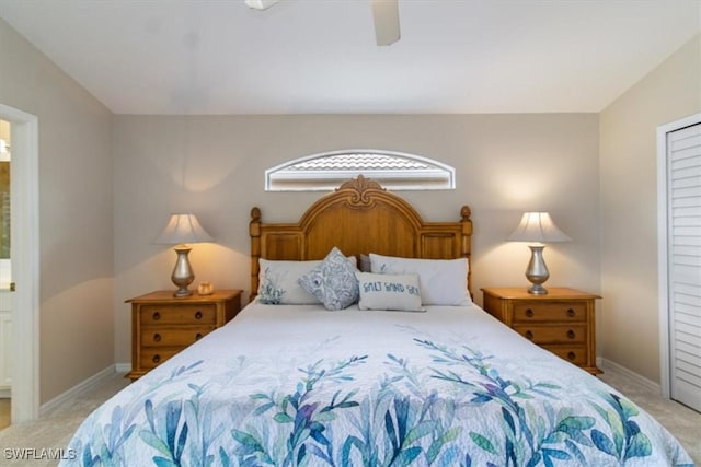 carpeted bedroom with ceiling fan