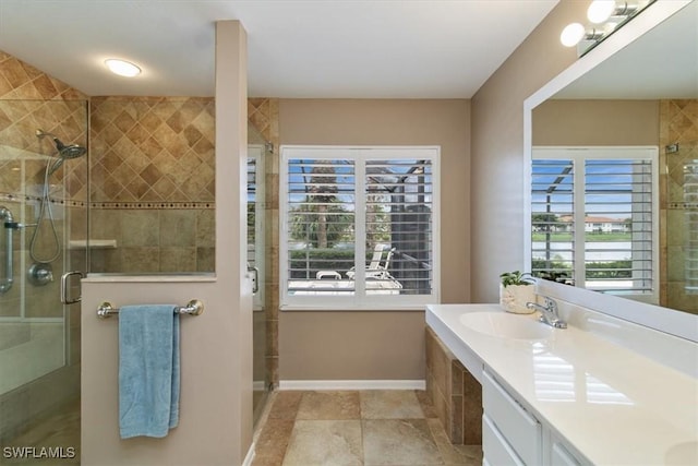 bathroom with sink and walk in shower