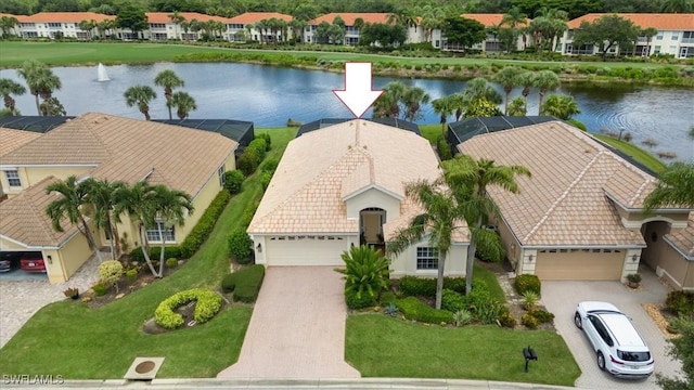 birds eye view of property featuring a water view