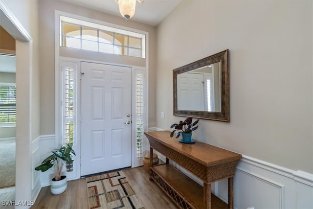 foyer entrance with light hardwood / wood-style floors