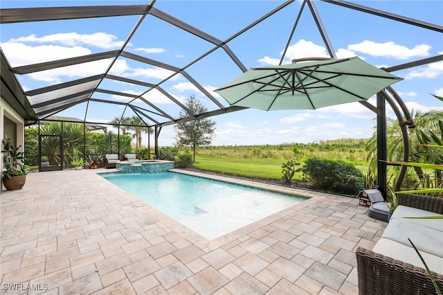 view of pool with an in ground hot tub, a patio area, and a lanai