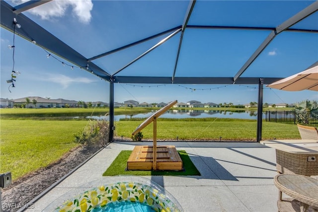 view of patio / terrace with a water view