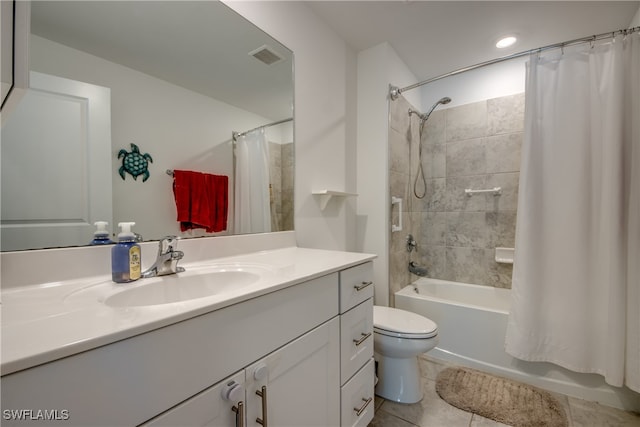 full bathroom with toilet, vanity, tile patterned floors, and shower / bath combo with shower curtain