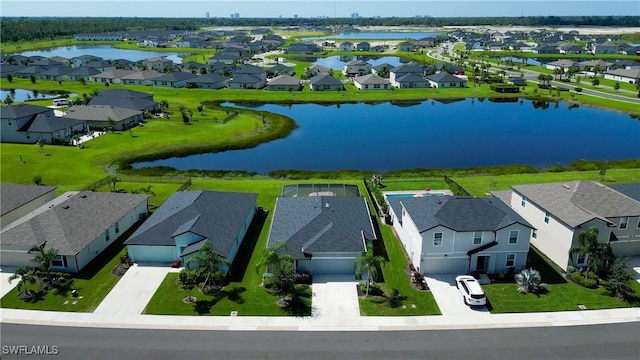 aerial view featuring a residential view and a water view