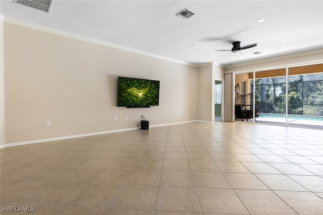 empty room with light tile patterned floors, crown molding, and ceiling fan