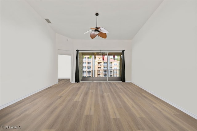 spare room featuring ceiling fan and wood-type flooring