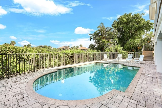 view of pool with a patio