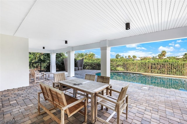 view of patio / terrace featuring a fenced in pool