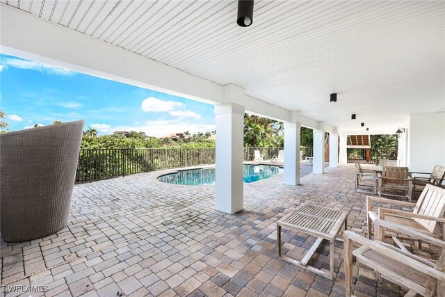 view of swimming pool featuring a patio