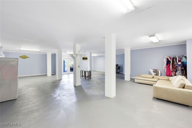 living room with concrete flooring