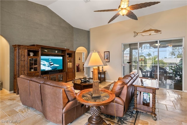 living room featuring lofted ceiling and ceiling fan