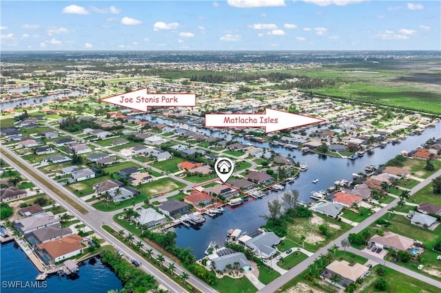 aerial view with a residential view and a water view