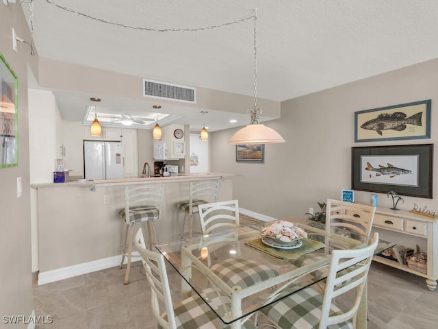 dining room with sink