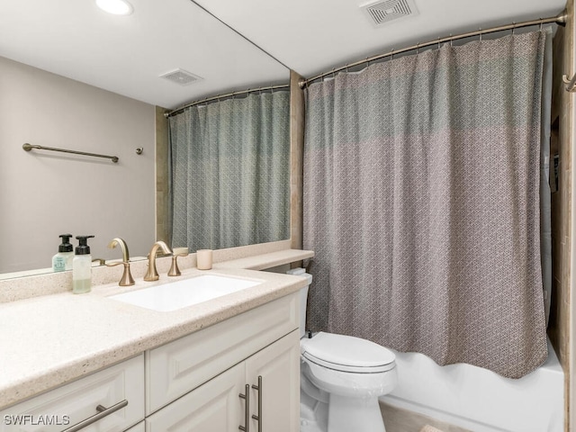 full bathroom featuring vanity, toilet, and shower / bath combo with shower curtain