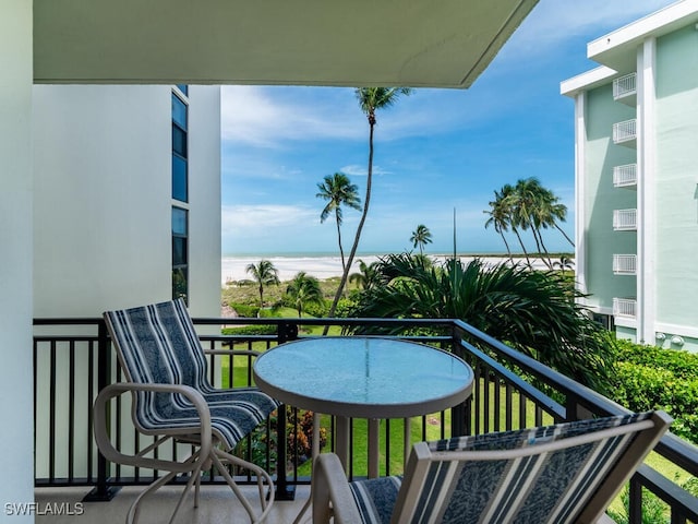 balcony featuring a water view