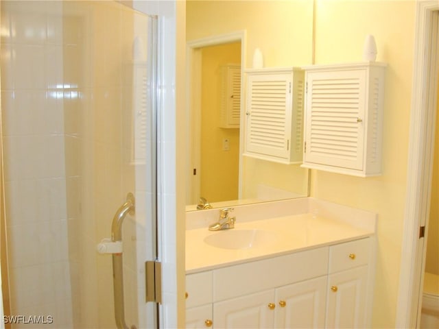 1001 Arbor Lake Dr Unit 203, Naples, FL 34110 - bathroom with toilet, a shower stall, and vanity