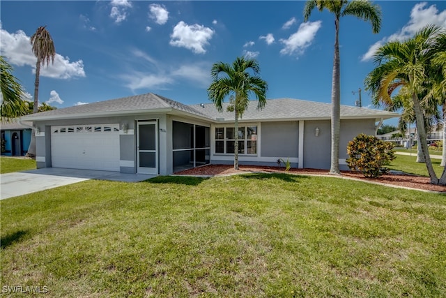 single story home featuring a garage and a front lawn