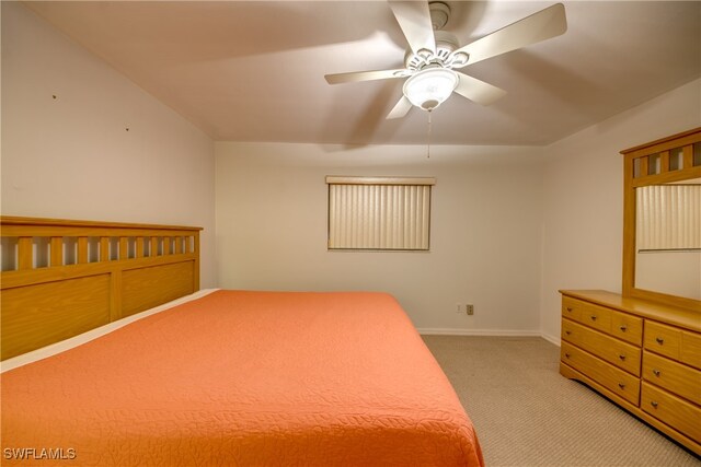 unfurnished bedroom featuring ceiling fan and light colored carpet