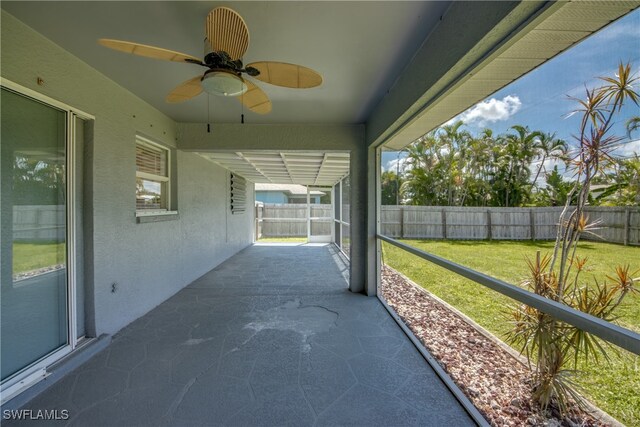 view of patio featuring ceiling fan