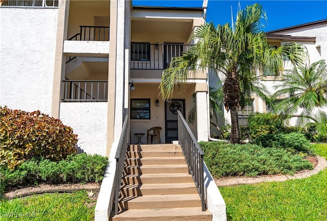 doorway to property with a balcony